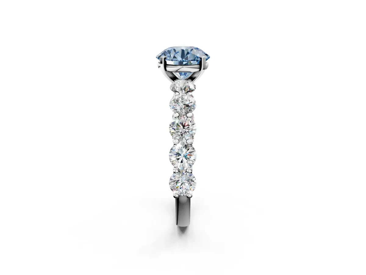 Fancy Blue Round Cut Diamond Prong Setting with Side Stones on a Pave Band White gold