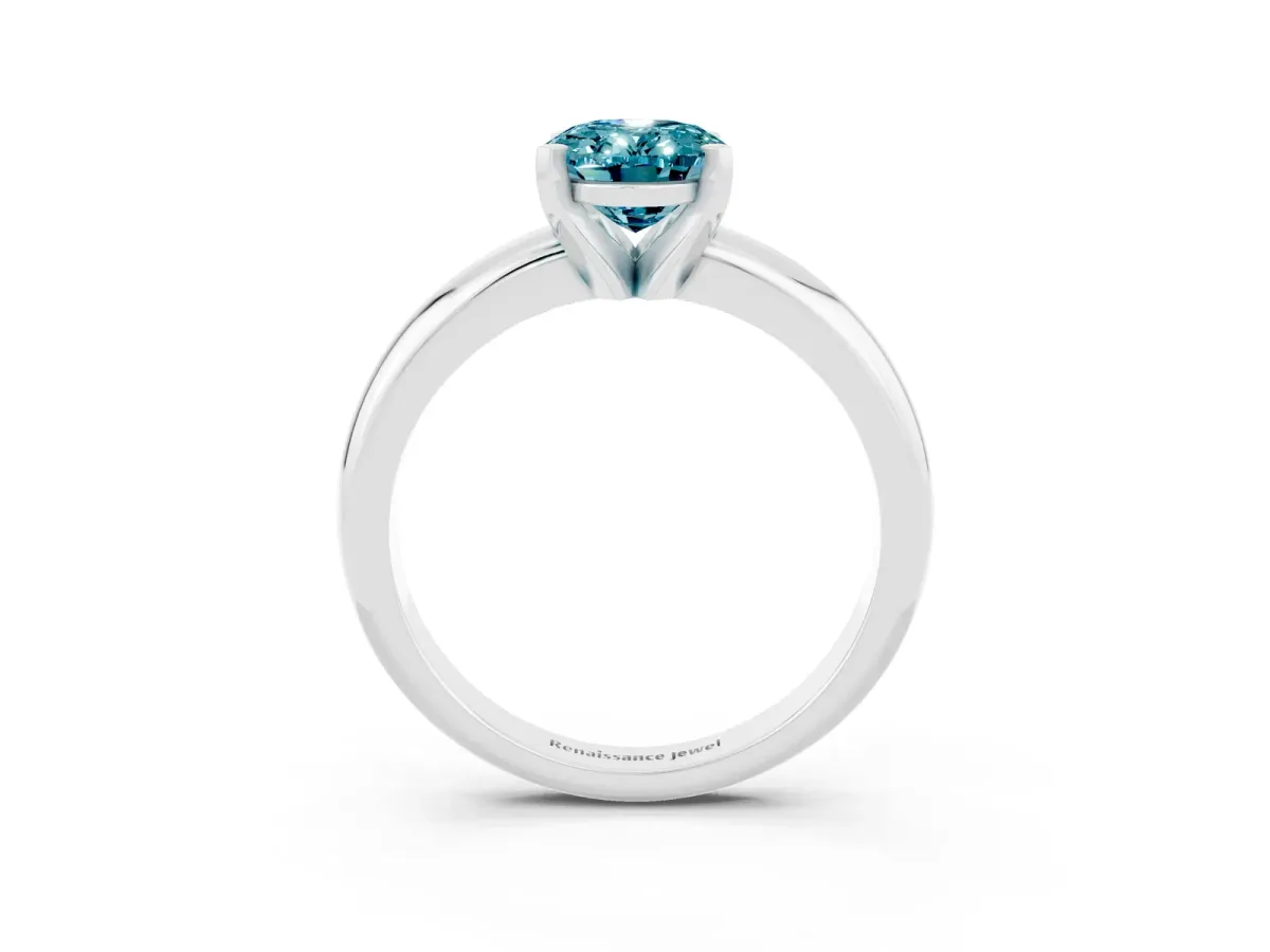 Oval Cut Blue Topaz Solitaire Engagement Ring with Round Band and Four-Prong Setting Silver