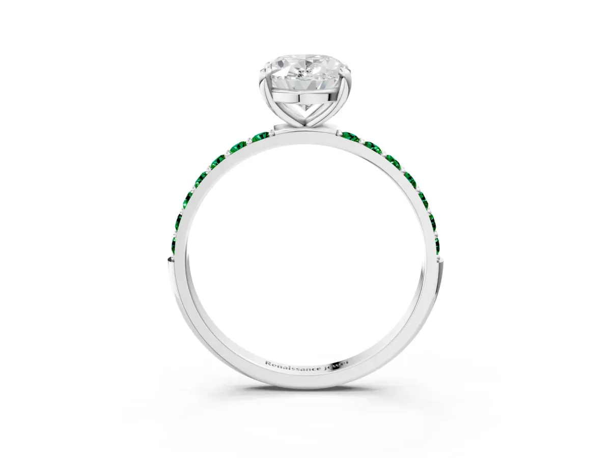 Oval Cut Diamond Solitaire Ring with Round Emerald Pavé Band and Prong Setting Silver