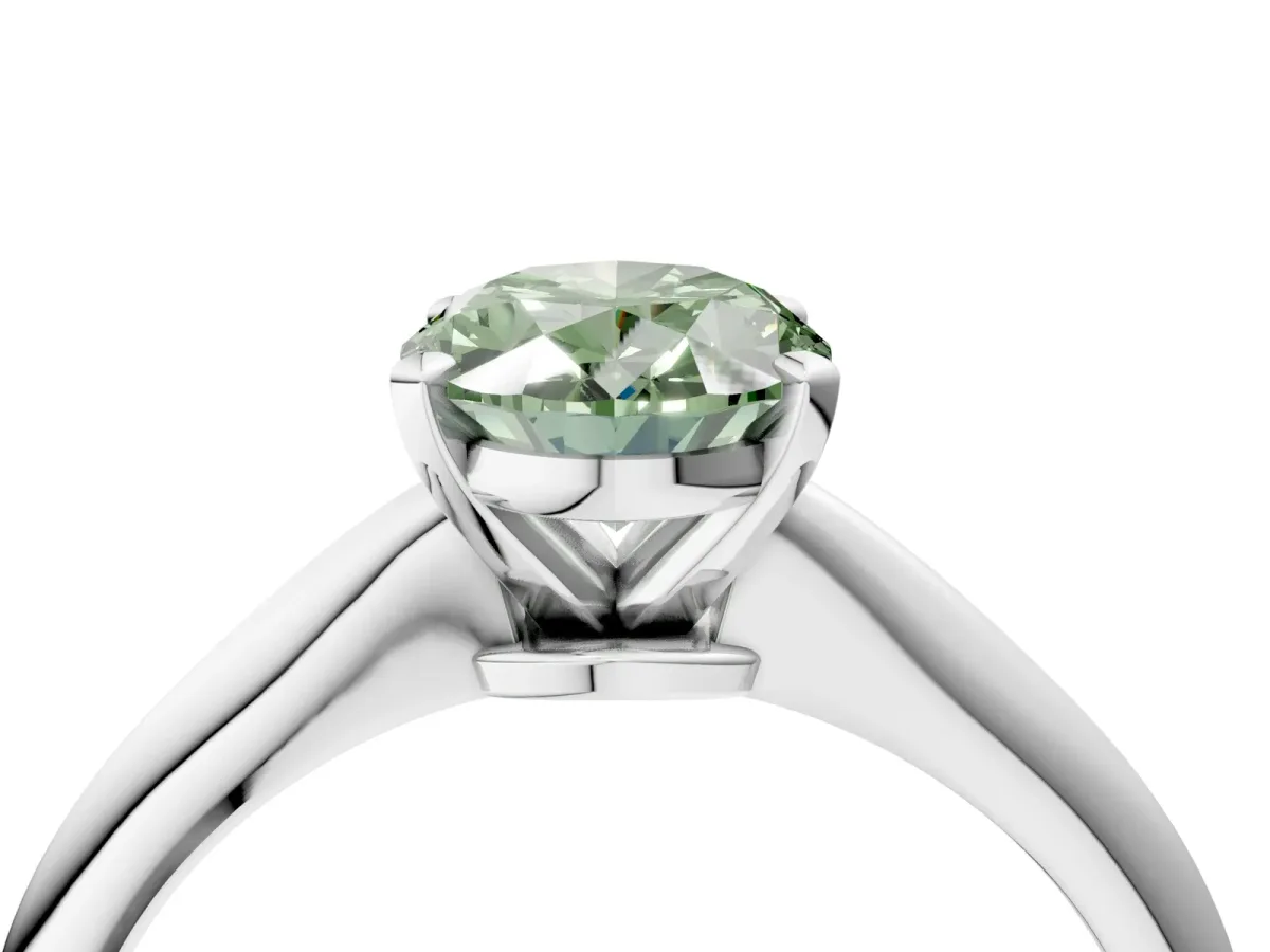 Fancy Green Oval Cut Diamond Solitaire Engagement Ring with Classic Band and Four-Prong Setting Silver
