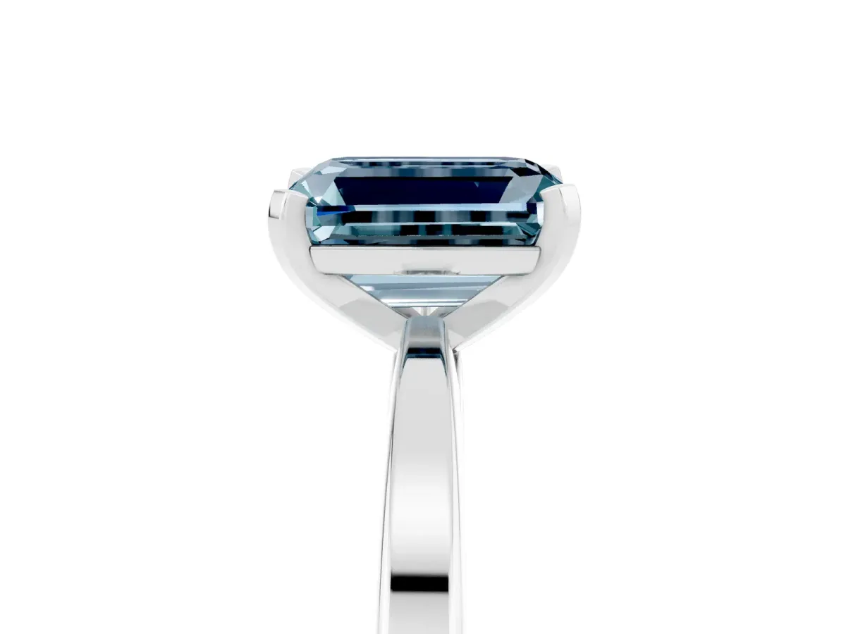 Emerald Cut Aquamarine Solitaire Engagement Ring with Classic Band and Four-Prong Setting Silver