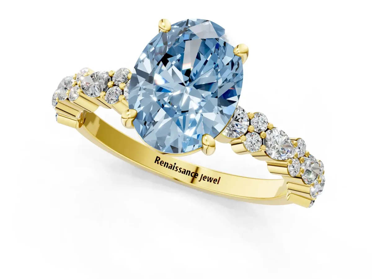 Fancy Blue Oval Cut Diamond Side Stone Solitaire Ring with Round and Four-Prong Setting Yellow gold