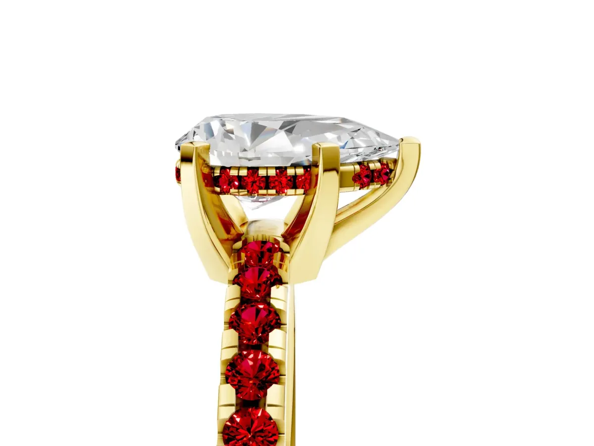 Pear Cut Diamond Solitaire Ring with Round Ruby Pavé Band and Four-Prong Setting Yellow gold