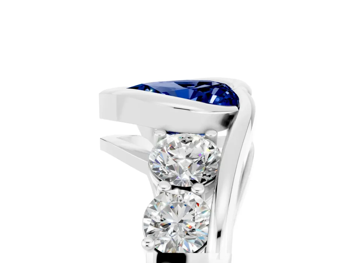 Bezel Set Heart Cut Blue Sapphire Bypass Ring with Round Accents Silver