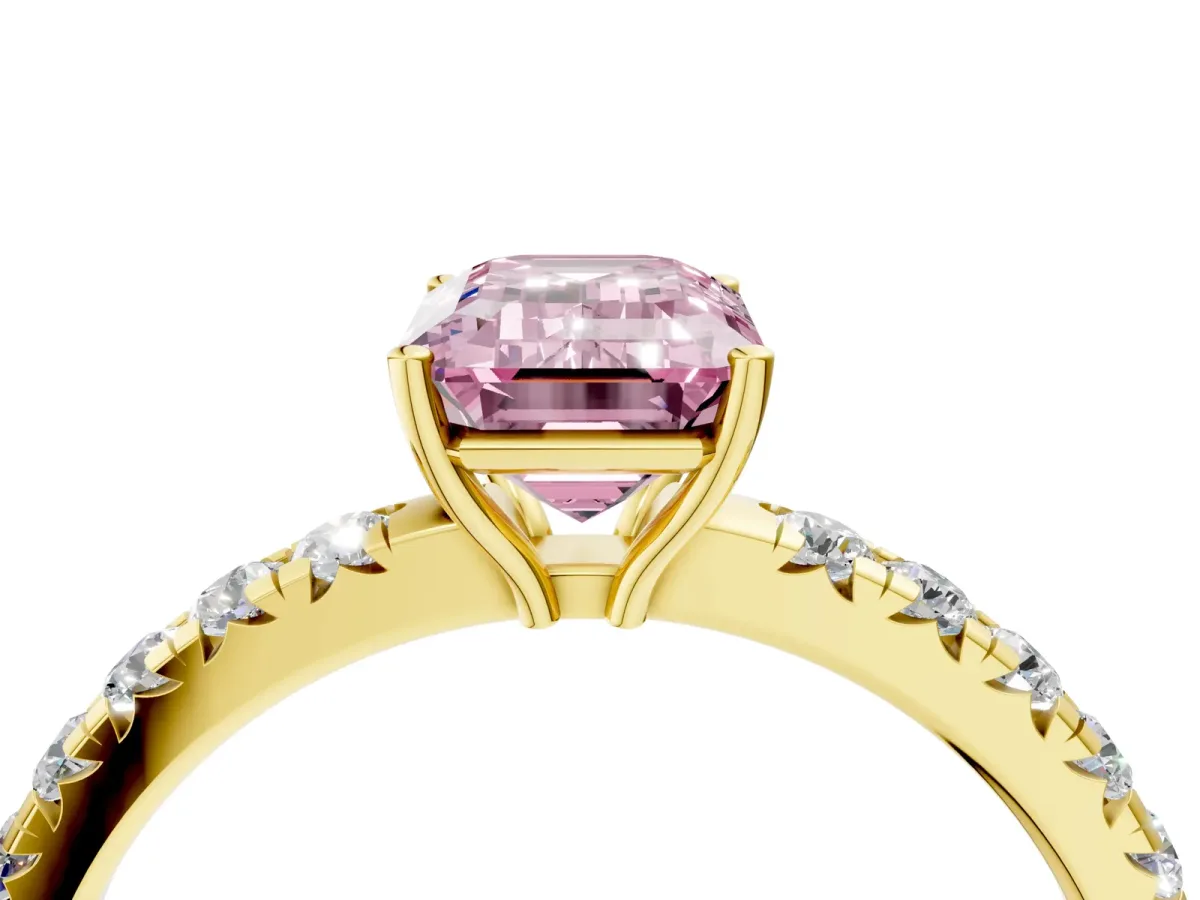 Fancy Pink Emerald Cut Diamond Pavé Solitaire Engagement Ring with Four-Prong Setting Yellow gold