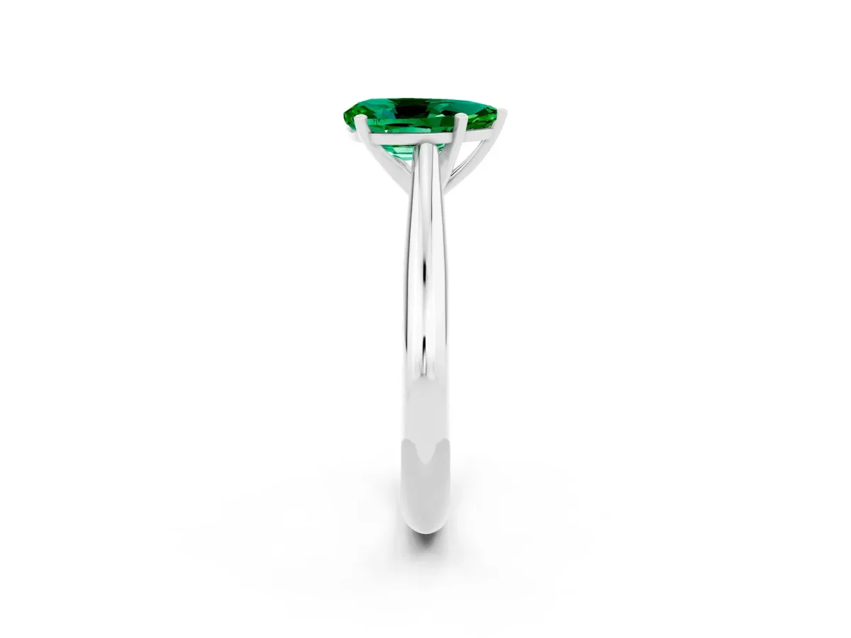 Pear Cut Emerald Solitaire Engagement Ring with Cathedral Setting and Four-Prong Mount White gold