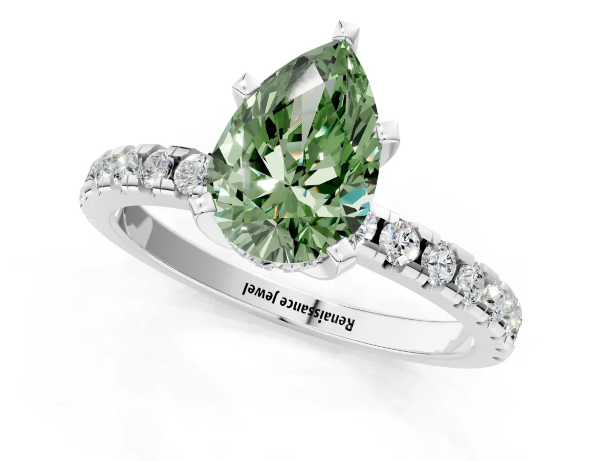 Fancy Green Pear Cut Diamond Solitaire Ring with Round Pavé Band and Four-Prong Setting Silver