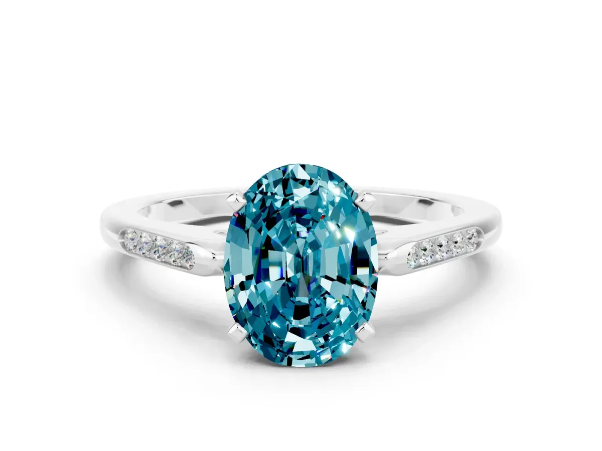 Oval Cut Blue Topaz Solitaire Ring with Channel Set Round Band and Prong Setting Silver