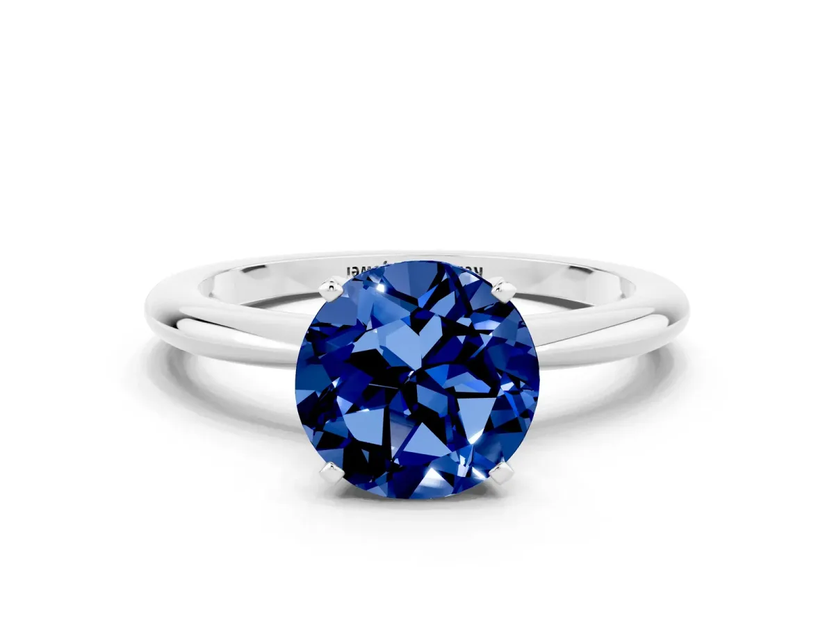 Round Cut Blue Sapphire Solitaire Ring with Six-Prong Setting and Classic Band Silver