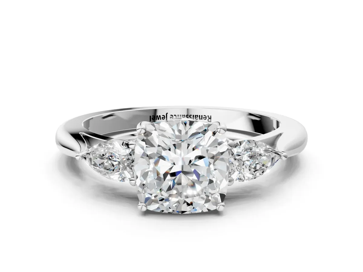 Three-Stone Cushion Cut Diamond Ring with Pear Side Stones in Four-Prong Setting White gold