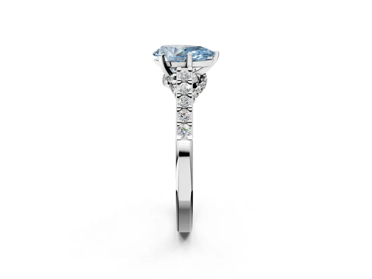 Fancy Blue Pear Cut Diamond Solitaire Ring with Crossover Gallery and Round Pavé Band Silver