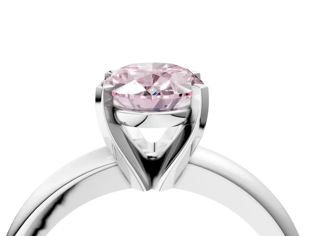 Fancy Pink Oval Cut Diamond Solitaire Engagement Ring with Round Band and Four-Prong Setting Silver