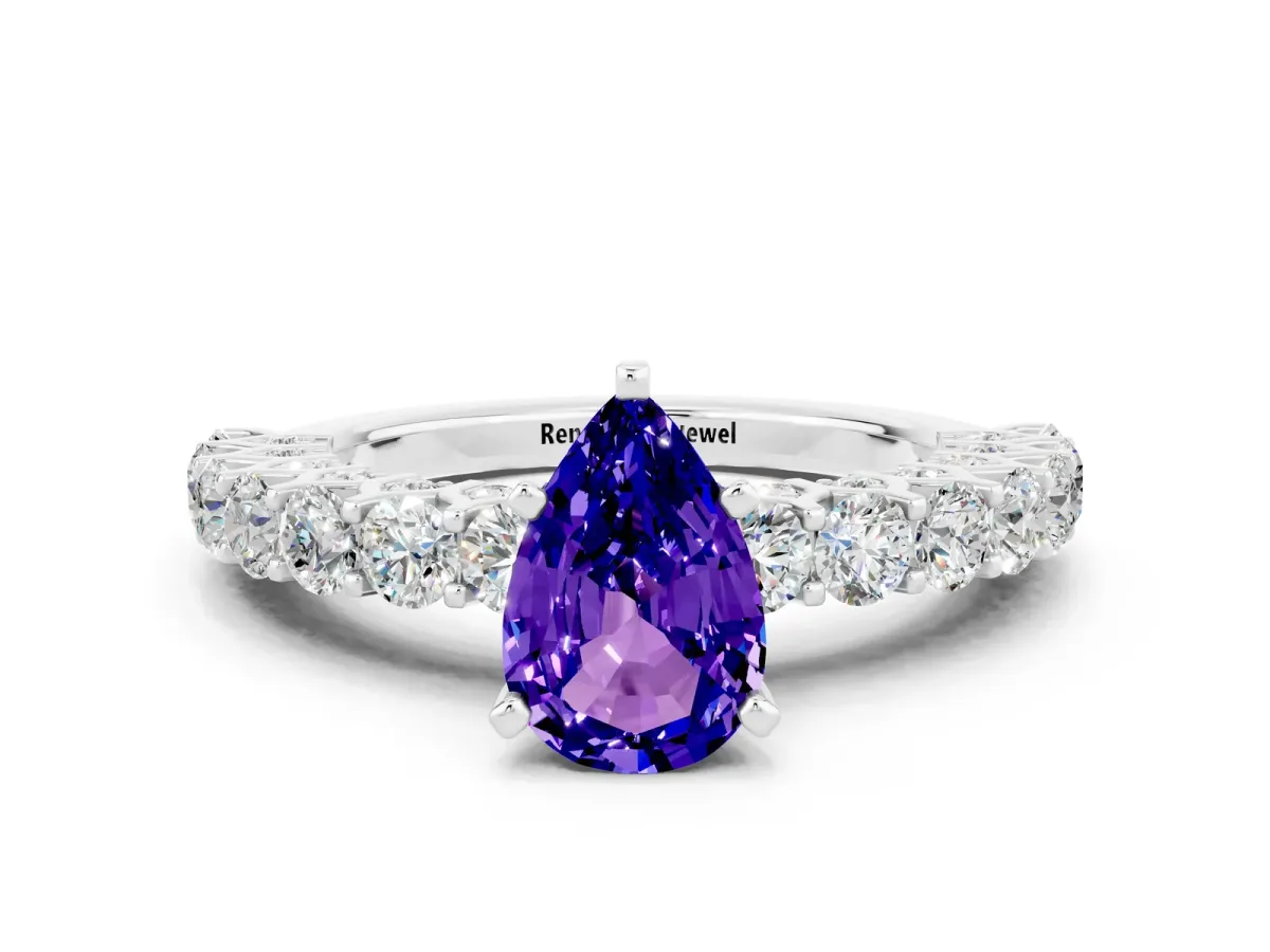 Pear Cut Tanzanite Solitaire Ring with Shared Prong Pavé Band and Four-Prong Setting Silver