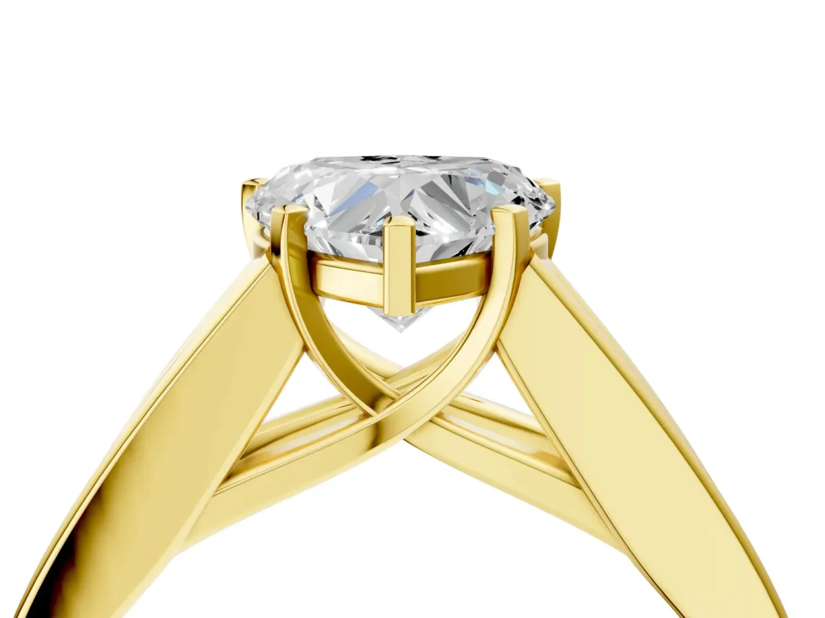 Heart Cut Cut Channel Set Solitaire Ring with Four-Prong Setting Yellow gold