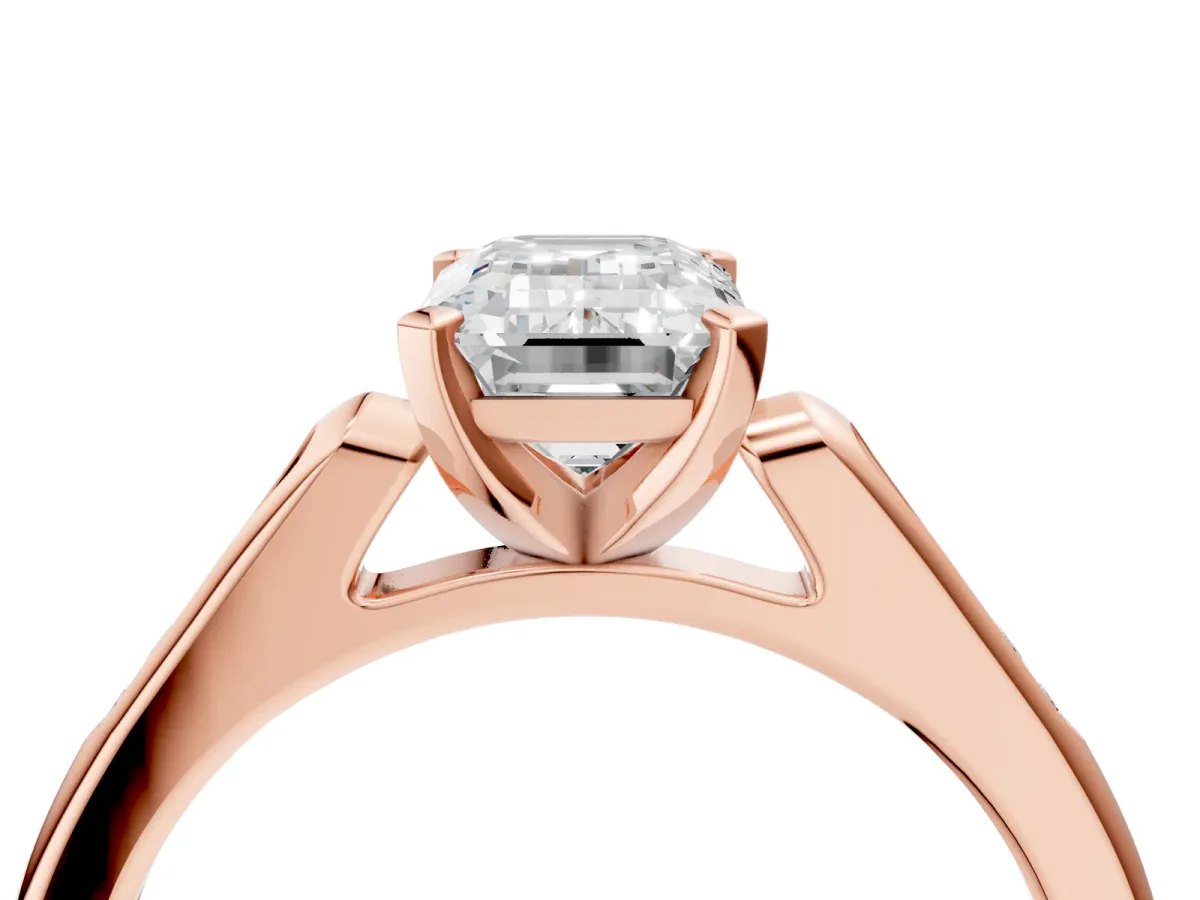 Emerald Cut Diamond Solitaire Ring with Channel Set Round Band and Prong Setting Rose gold