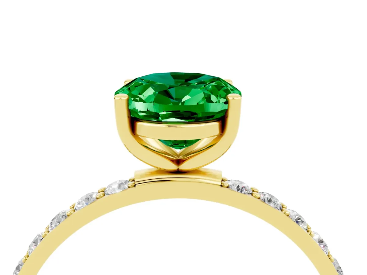 Oval Cut Emerald Solitaire Ring with Round Pavé Band and Prong Setting Yellow gold