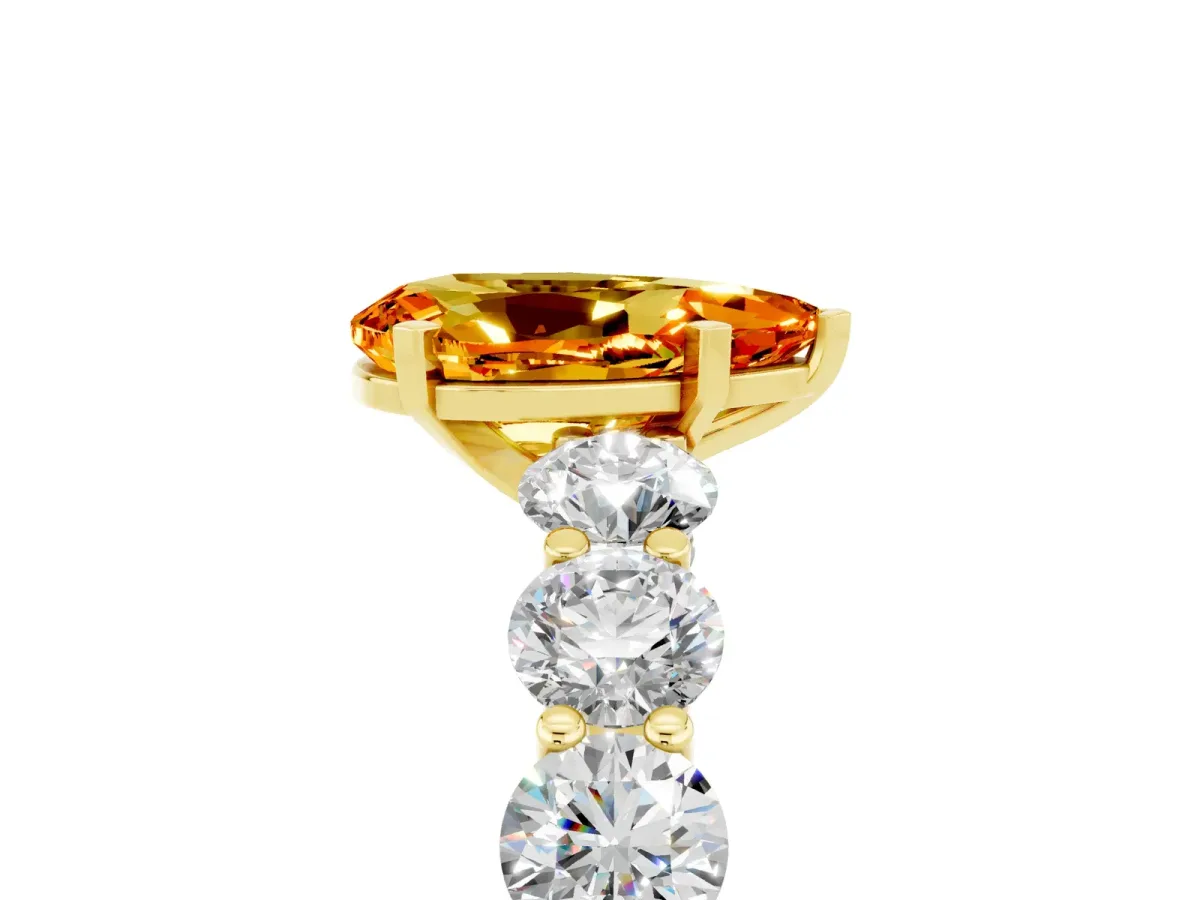 Pear Cut Citrine Prong Setting with Side Stones on a Pave Band Yellow gold