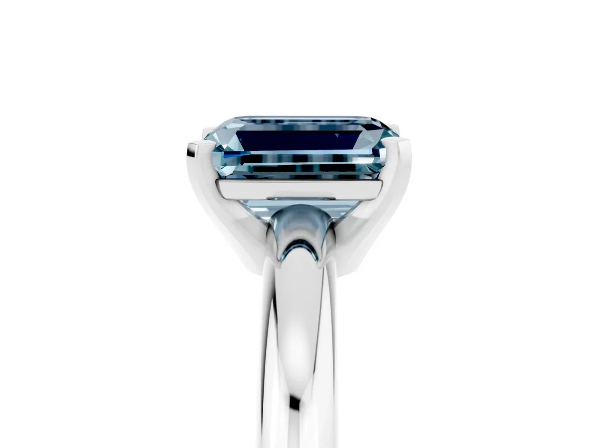 Emerald Cut Aquamarine Solitaire Engagement Ring with Round Band and Four-Prong Setting Silver