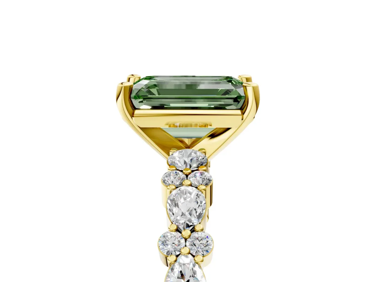 Fancy Green Emerald Cut Diamond Side Stone Solitaire Ring with Round and Four-Prong Setting Yellow gold