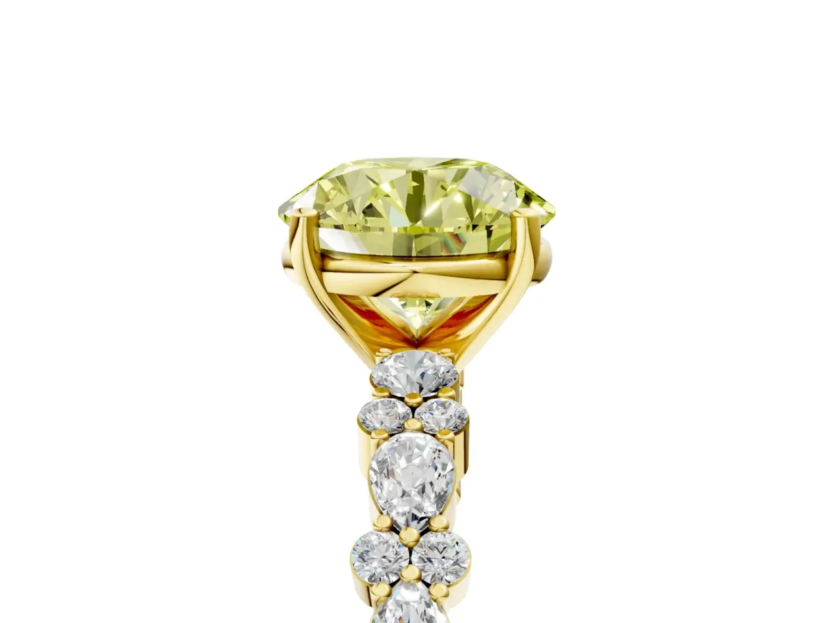 Fancy Yellow Round Cut Diamond Side Stone Solitaire Ring with Round and Four-Prong Setting Yellow gold