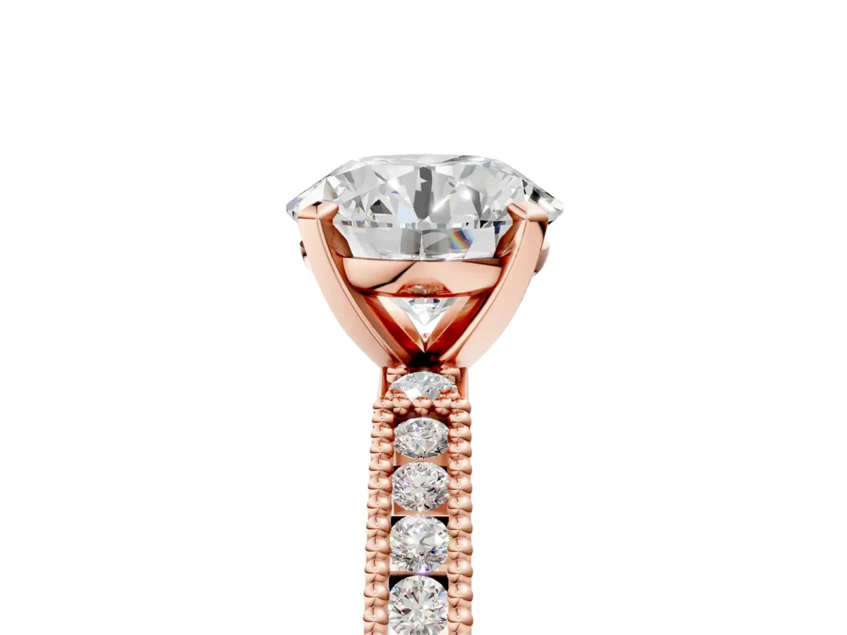 Round Cut Solitaire with Pavé Band and Four-Prong Setting Rose gold