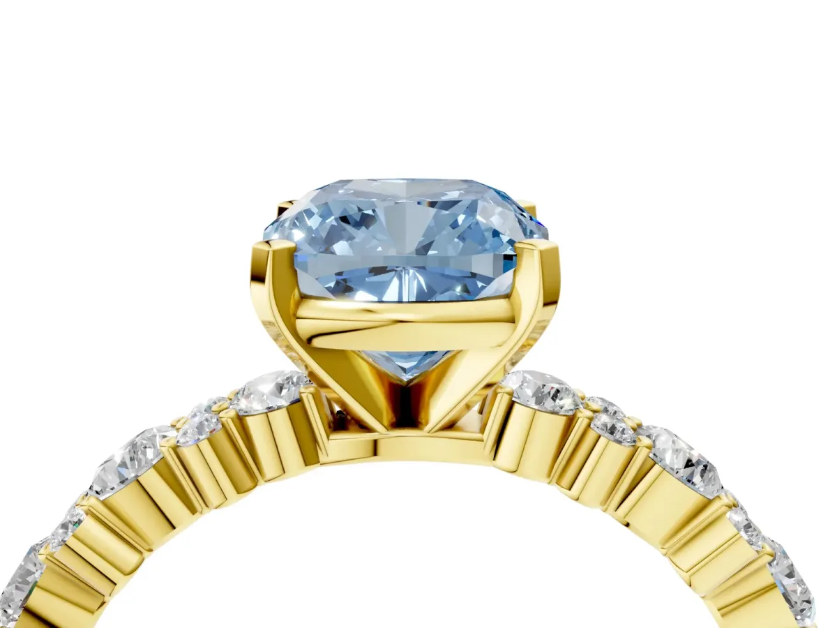 Fancy Blue Cushion Cut Diamond Side Stone Solitaire Ring with Round and Four-Prong Setting Yellow gold