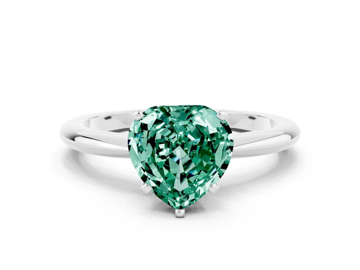 Heart Cut Green Sapphire Solitaire Ring with Six-Prong Setting and Classic Band Silver