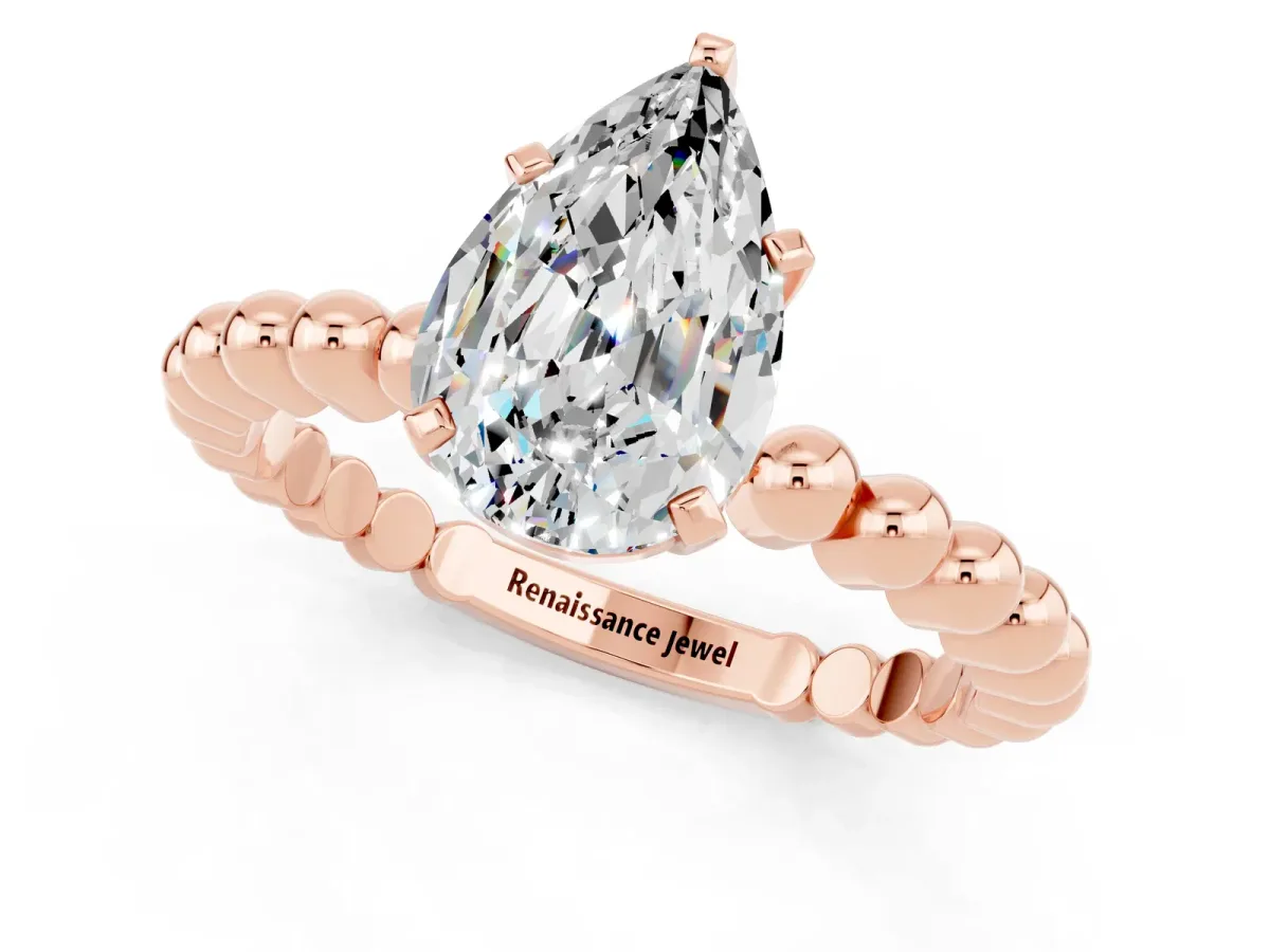 Pear Cut Moissanite Solitaire Ring with Beaded Band and Prong Setting Rose gold