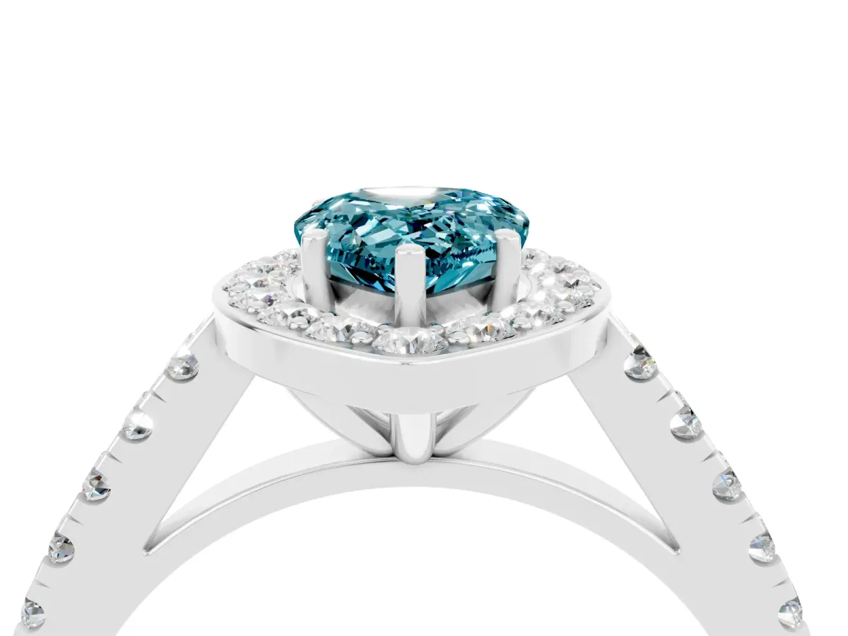 Pear Cut Blue Topaz Halo Ring with Round Pavé Split Shank and Prong Setting Platinum