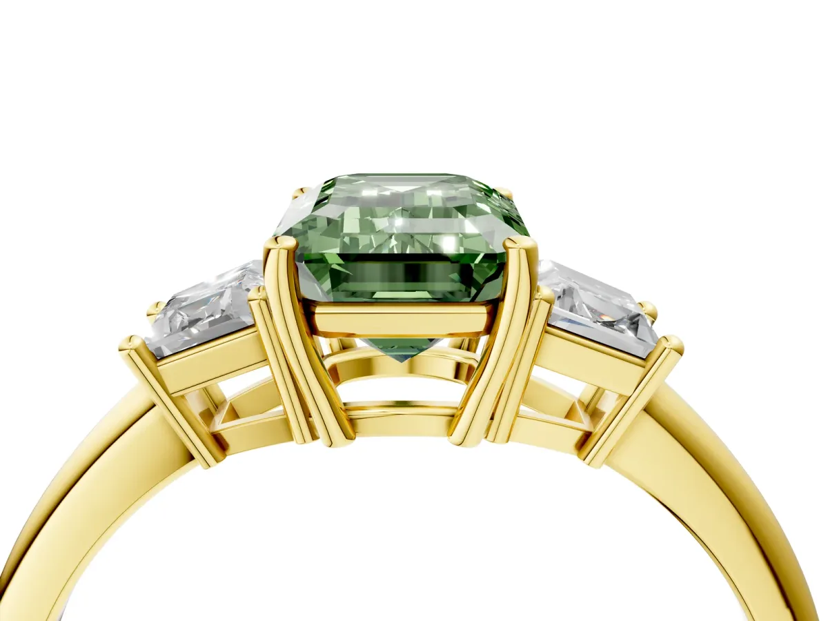 Fancy Green Emerald Cut Diamond Three-Stone Ring with Trapezoid Side Stones and Prong Setting Yellow gold