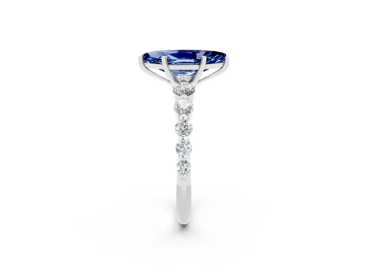 Marquise Cut Solitaire Blue Sapphire Ring with Pave Band and Four-Prong Setting Silver
