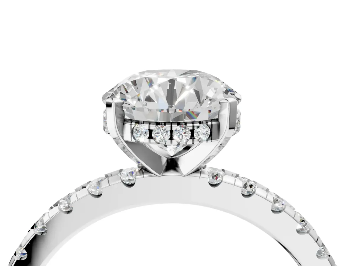 Round Cut Diamond Solitaire Ring with Round Moissanite Pavé Band and Four-Prong Setting Silver