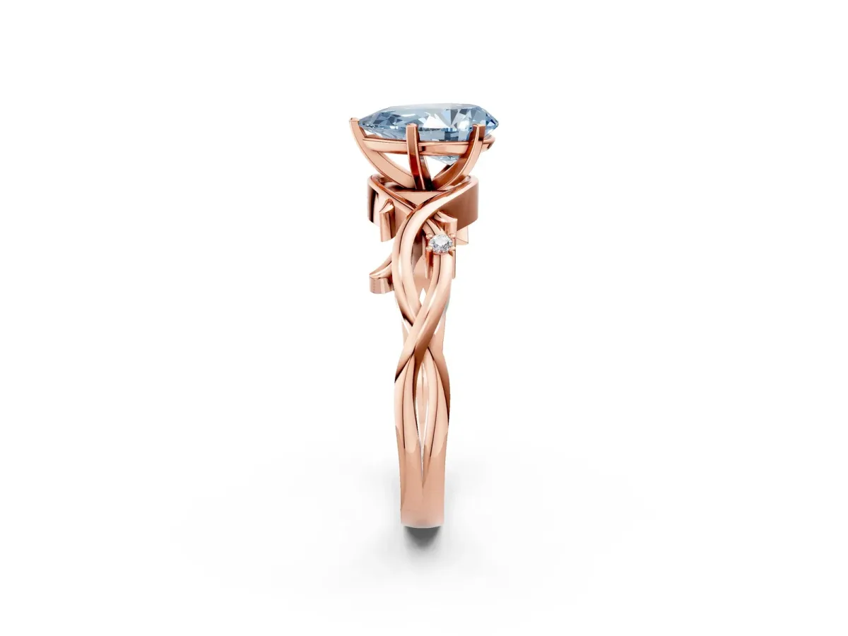 Fancy Blue Pear Cut Diamond Solitaire Ring with Twisted Band and Prong Setting Rose gold