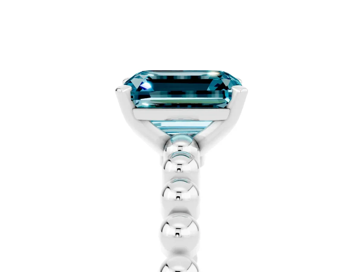 Emerald Cut Blue Topaz Solitaire Ring with Beaded Band and Prong Setting Platinum