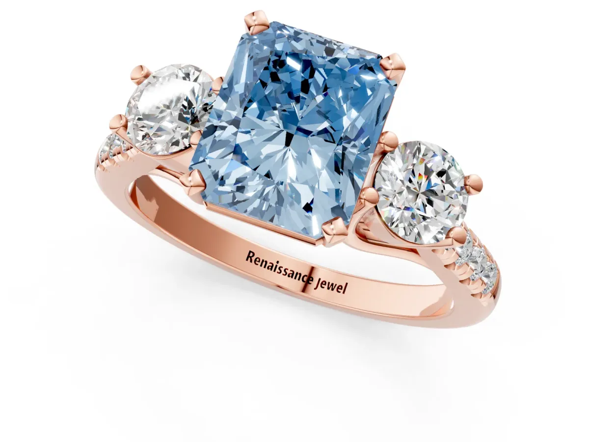Fancy Blue Three-Stone Radiant Cut Diamond Pavé Band with Four-Prong Setting Rose gold