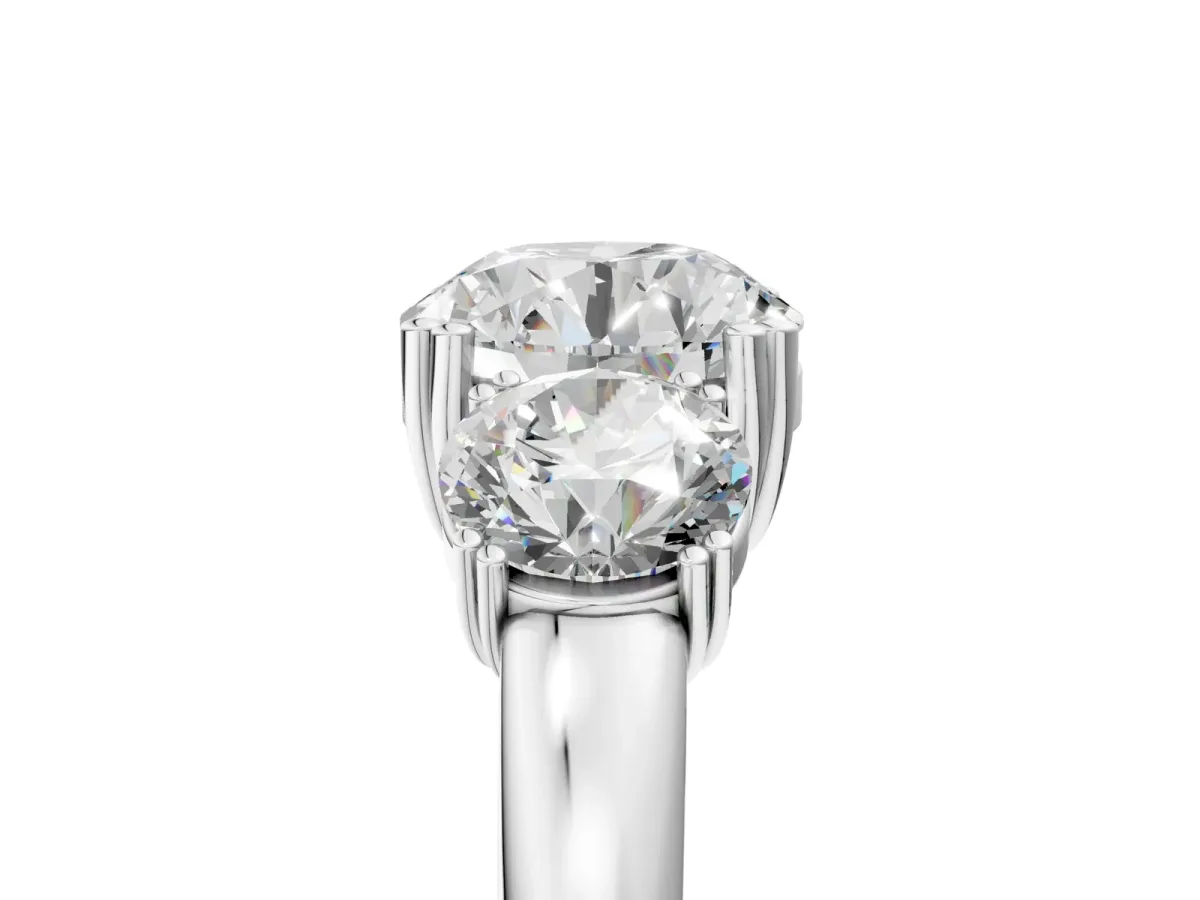 Three-Stone Round Cut Cut Diamond Ring with Channel Set Band and Four-Prong Setting White gold