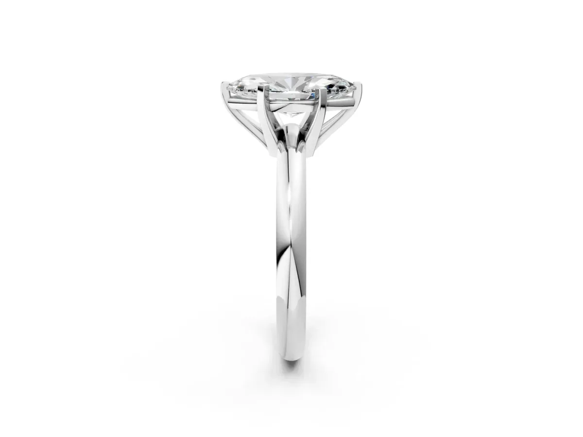 Marquise Cut Diamond Solitaire Engagement Ring with Round Band and Four-Prong Setting Silver