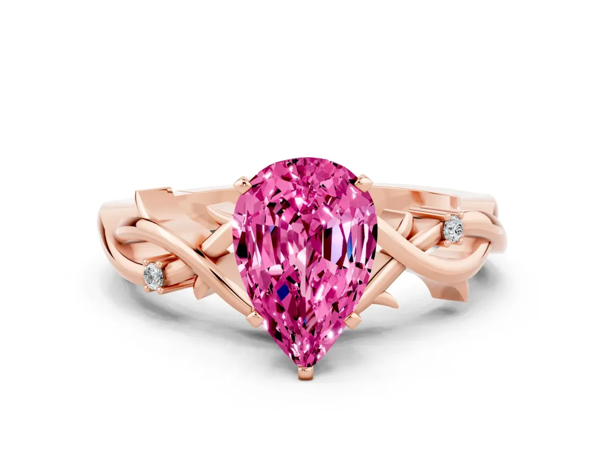 Pear Cut Pink Sapphire Solitaire Ring with Twisted Band and Prong Setting Rose gold