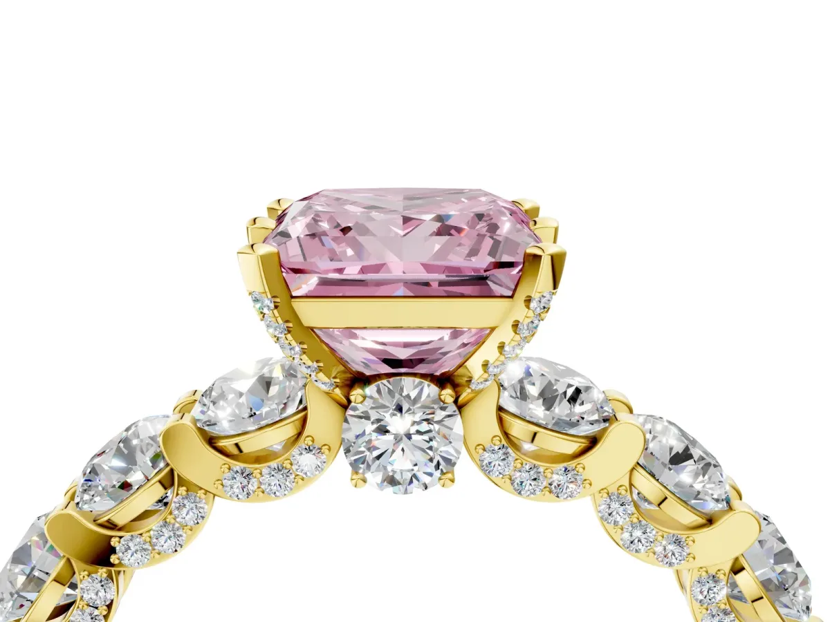 Fancy Pink Princess Cut Diamond Side Stone Engagement Ring with Four-Prong Setting Yellow gold
