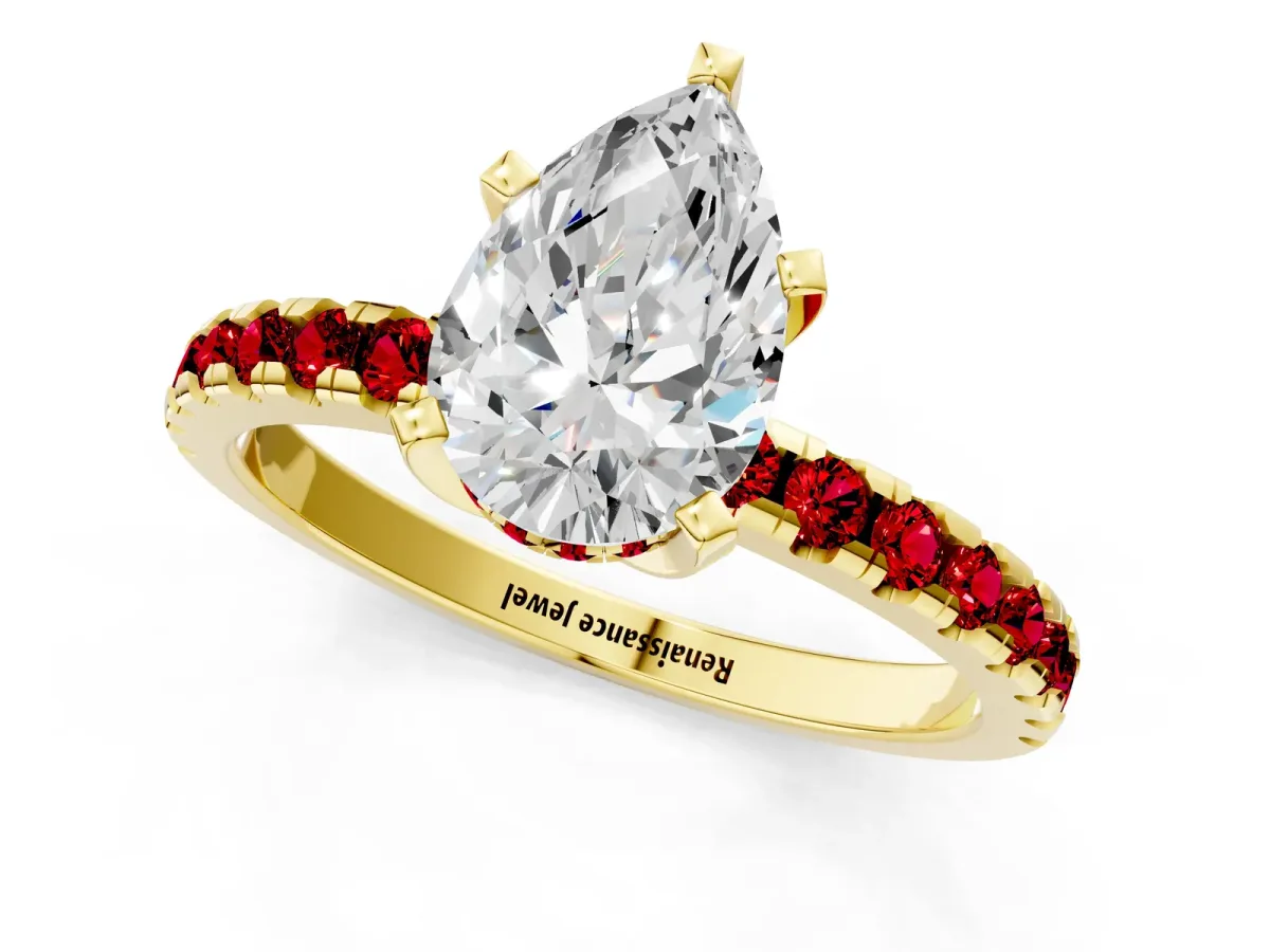 Pear Cut Diamond Solitaire Ring with Round Ruby Pavé Band and Four-Prong Setting Yellow gold