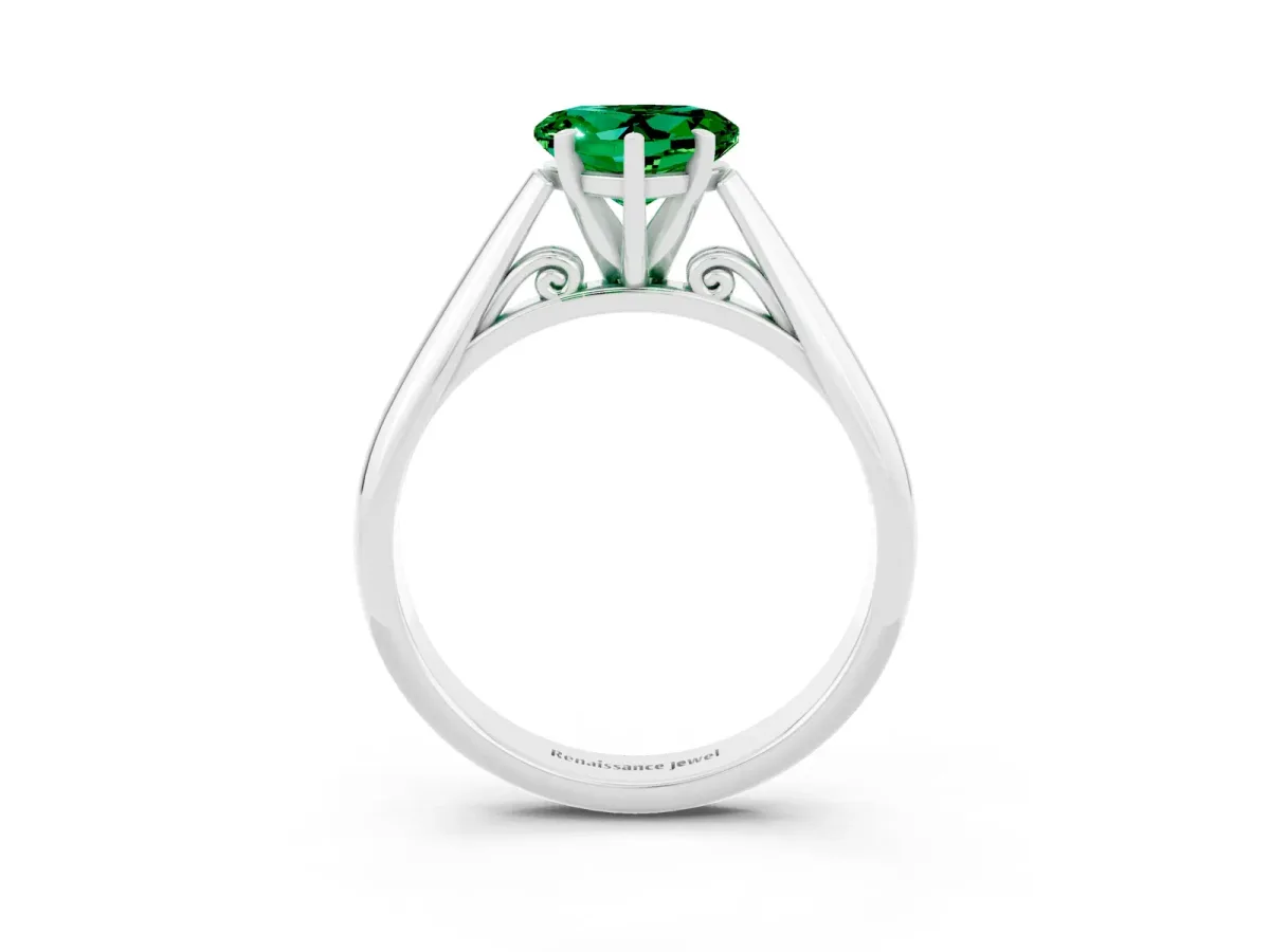 Heart Cut Emerald Solitaire Engagement Ring with Cathedral Setting and Four-Prong Mount White gold