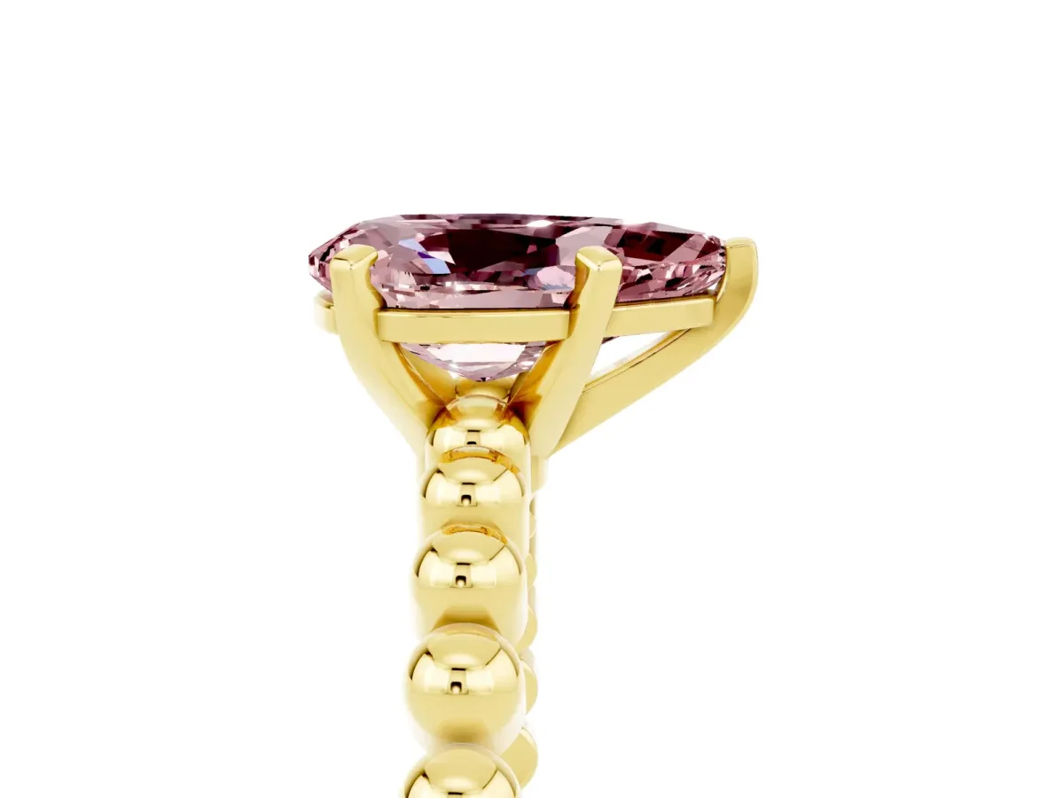 Pear Cut Morganite Solitaire Ring with Beaded Band and Prong Setting Yellow gold