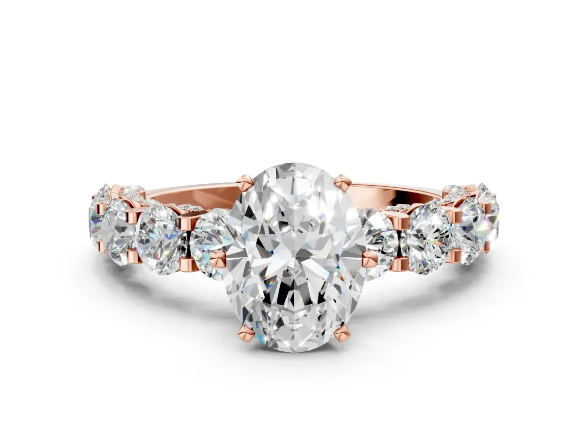 Oval Cut Diamond Side Stone Engagement Ring with Four-Prong Setting Rose gold