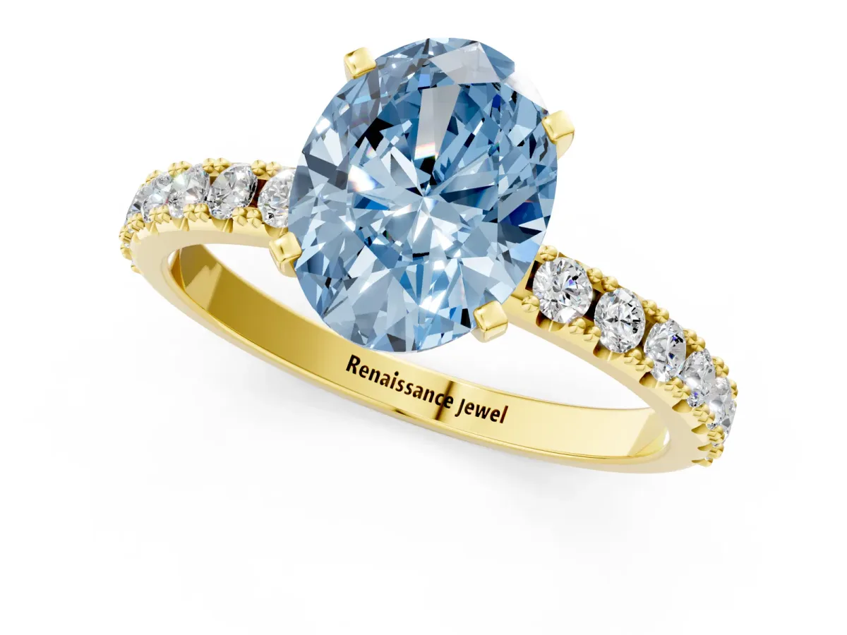 Fancy Blue Oval Cut Diamond Solitaire Pavé Band with Four-Prong Setting Yellow gold