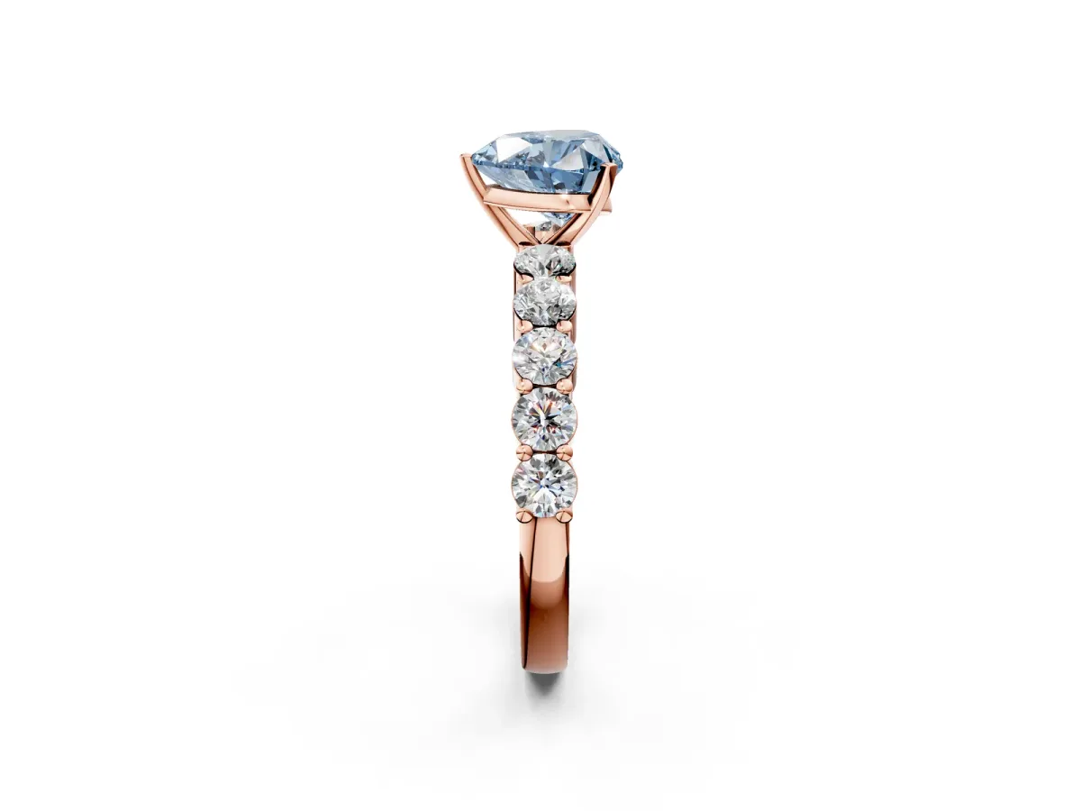 Fancy Blue Heart Cut Diamond Solitaire Ring with Shared Prong Round Side Stones Rose gold