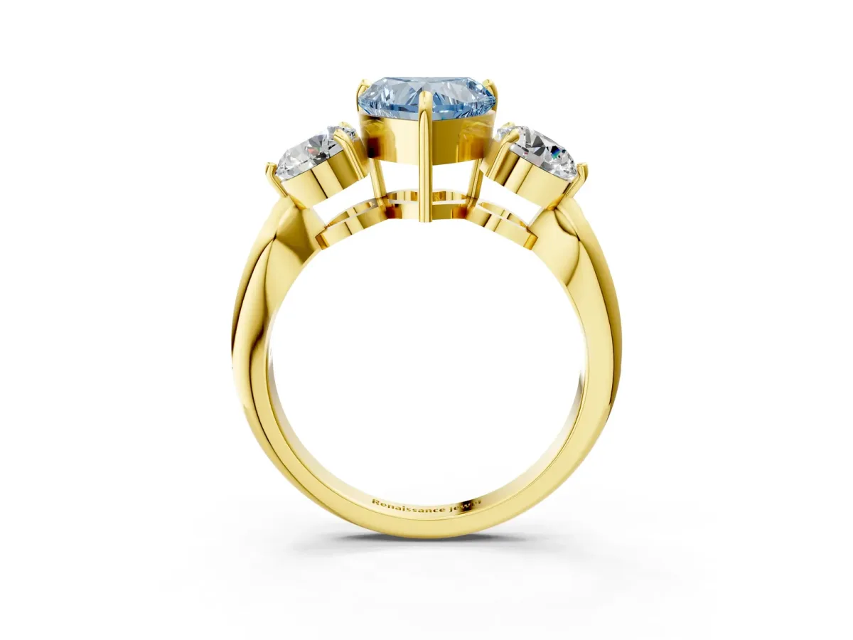 Fancy Blue Three-Stone Heart Cut Diamond Channel Set Engagement Ring with Prong Setting Yellow gold