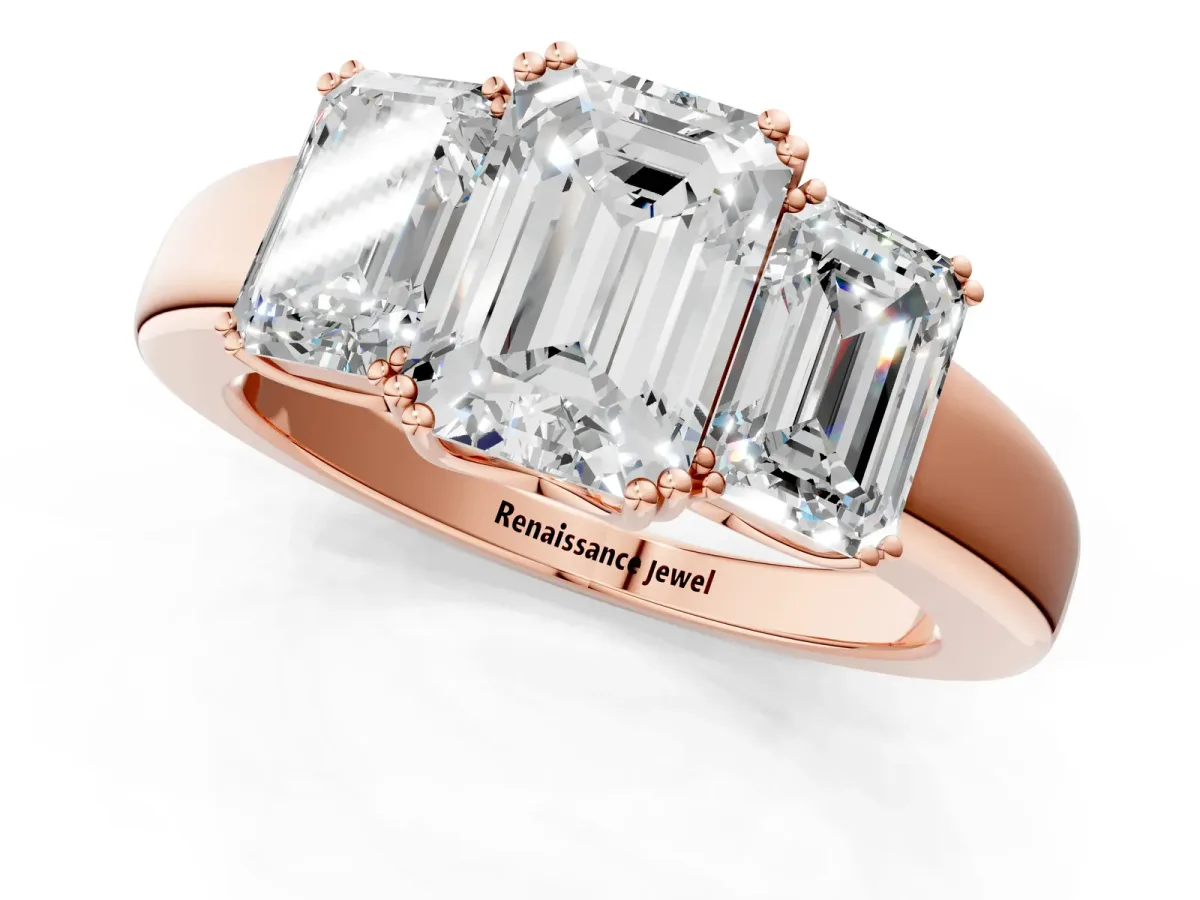 Three-Stone Emerald Cut Cut Diamond Ring with Channel Set Band and Four-Prong Setting Rose gold
