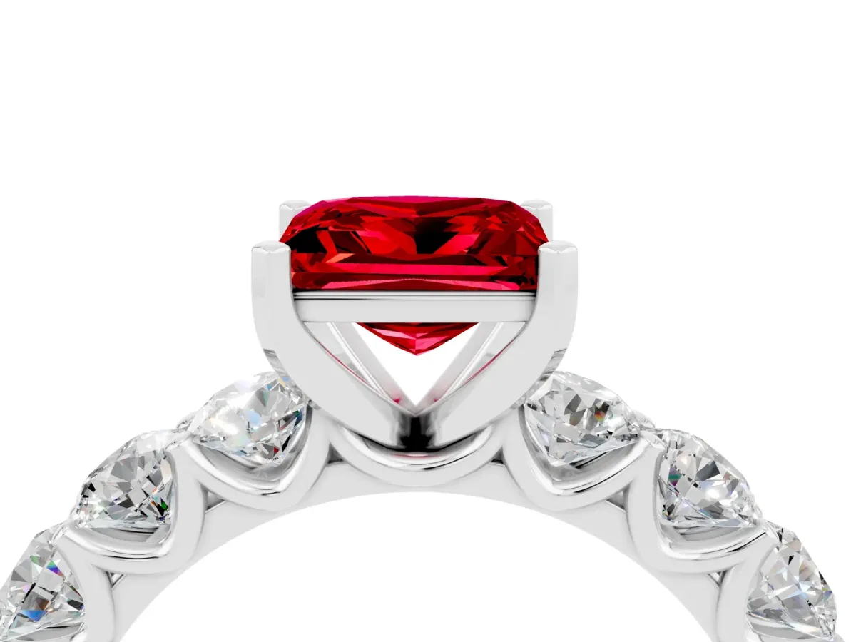 Princess Cut Ruby Prong Setting with Side Stones on a Pave Band White gold