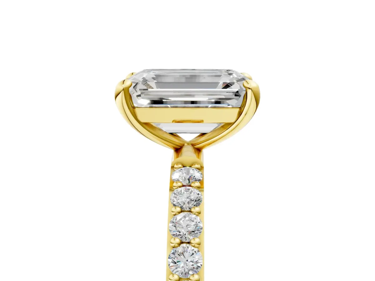 Emerald Cut Diamond Solitaire Ring with Round Pavé Band and Prong Setting Yellow gold