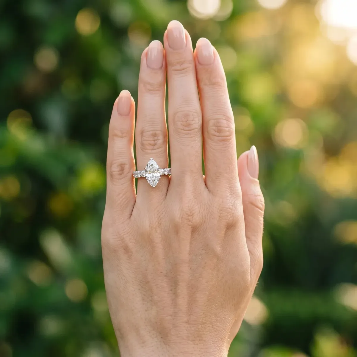 Marquise Cut Diamond Prong Setting with Side Stones on a Pave Band Silver